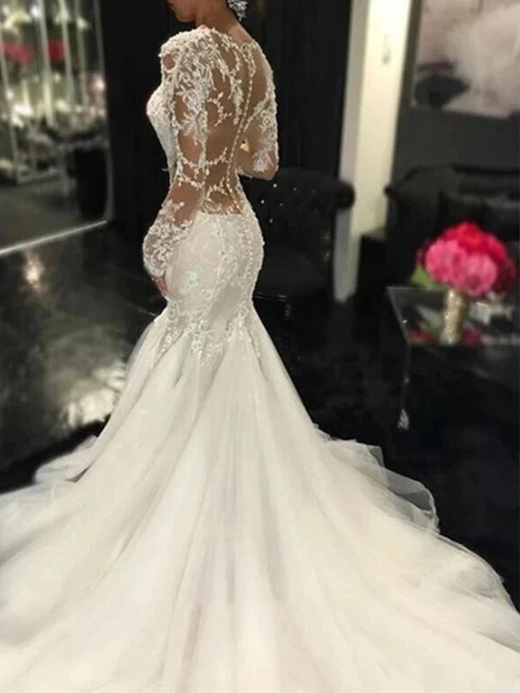 Luxury Lace Mermaid Wedding Dresses Dubai African Arabic V-neck See Through Long Sleeves Appliques Bridal Gown Vestido De Novia Ivory